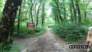 Tattooed MILF with small tits and big ass goes wild in an abandoned forest