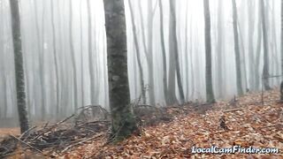 Solo female masturbates in nature's embrace