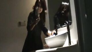 Asian Girl Uses a Bottle to Masturbate