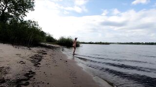 Exhibitionist Blonde Goes Nude on a River Beach
