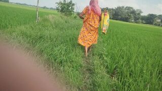 Village granny pee in the field