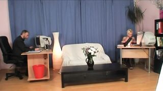 Boss bangs the young secretary and the old cleaning lady assists