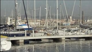 Two blondes have hard sex on the bridge of a yacht