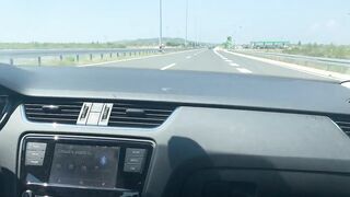 Big-Titted Brunette Sucks Driver's Cock in Car for a Mouthful of Cum