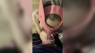 bound girl in handcuffs whimpering and sucking cock