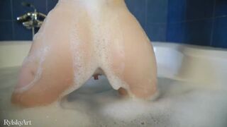 Sensual brunette with sexy erect nipples takes a bath and finger