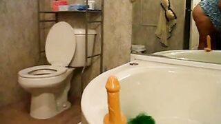 BBW Pleasures Herself with a Sex Toy on Webcam in the Bathroom