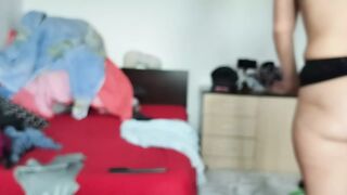 Amateur wife enjoys trying on the clothes she cuts. Amateur wife dances naked around the house.